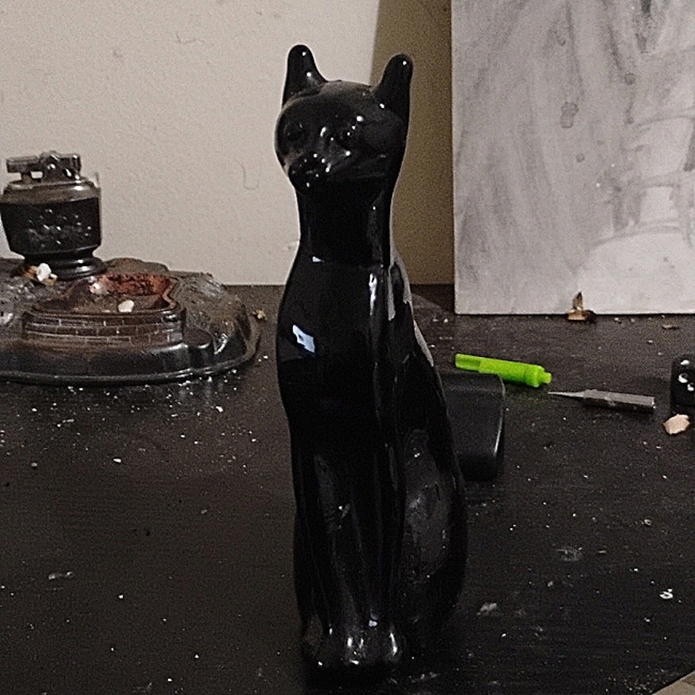 Black cat statue